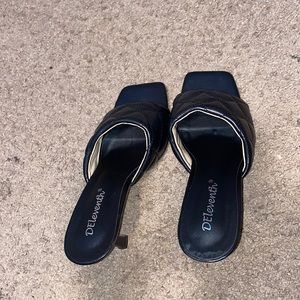 Black high heels, have been worn once.